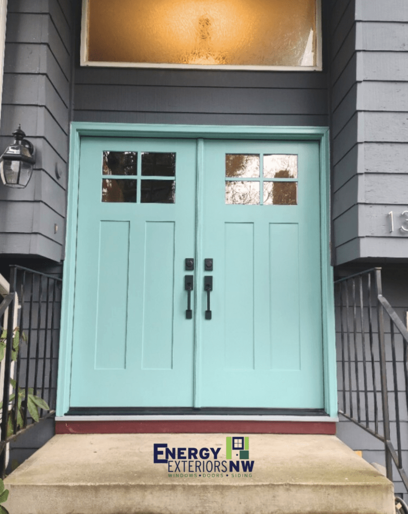 Turquoise double doors with frosted glass windows